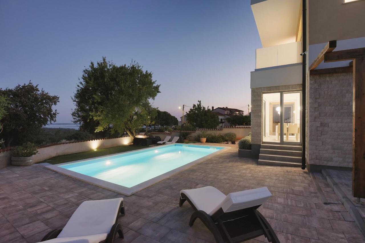 Villa White Barbariga Exterior photo